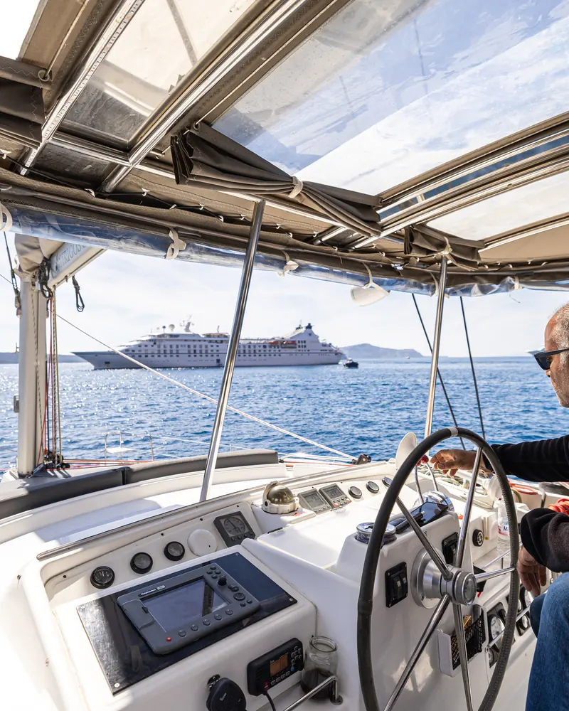 Our skipper at the helm crossing the caldera