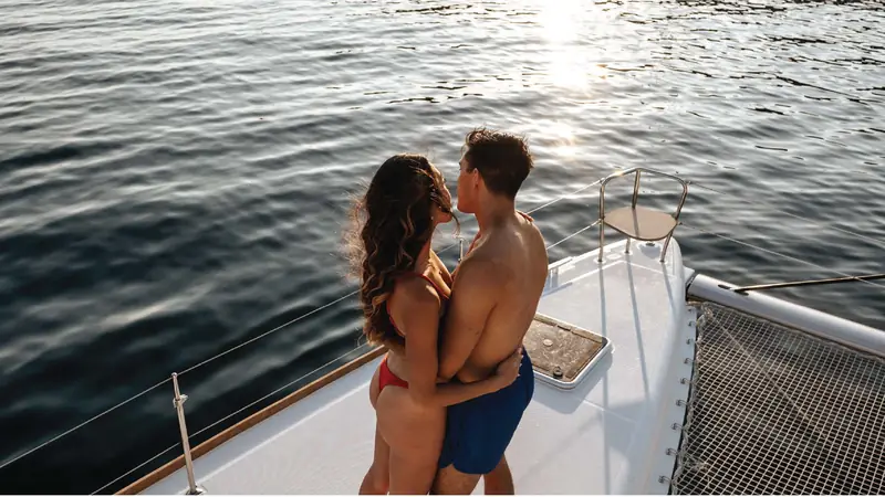 Golden-hour sunset catamaran cruise on the Santorini caldera